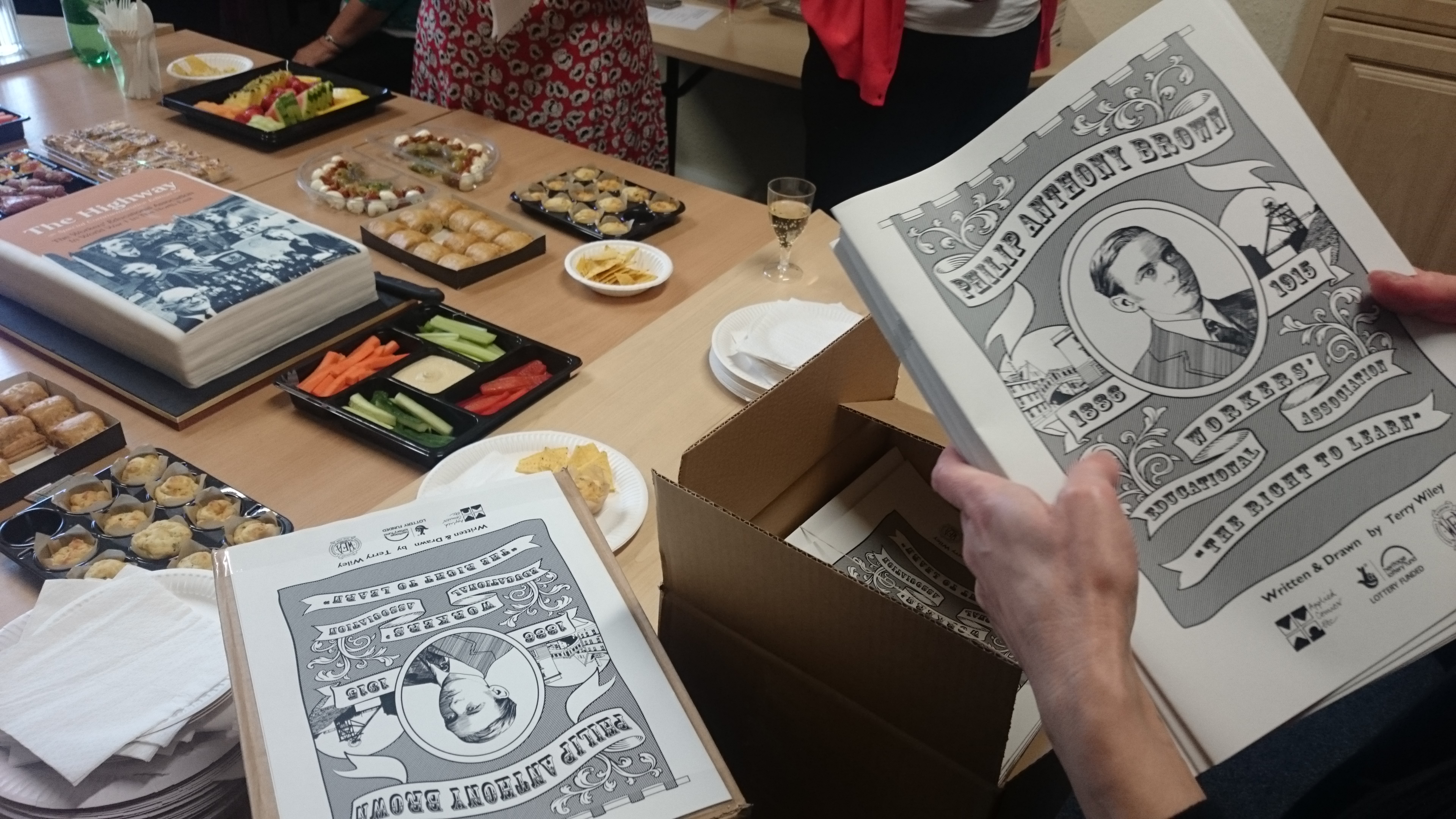 Unboxing 'The Right To Learn' comic at the WEA's project launch party
